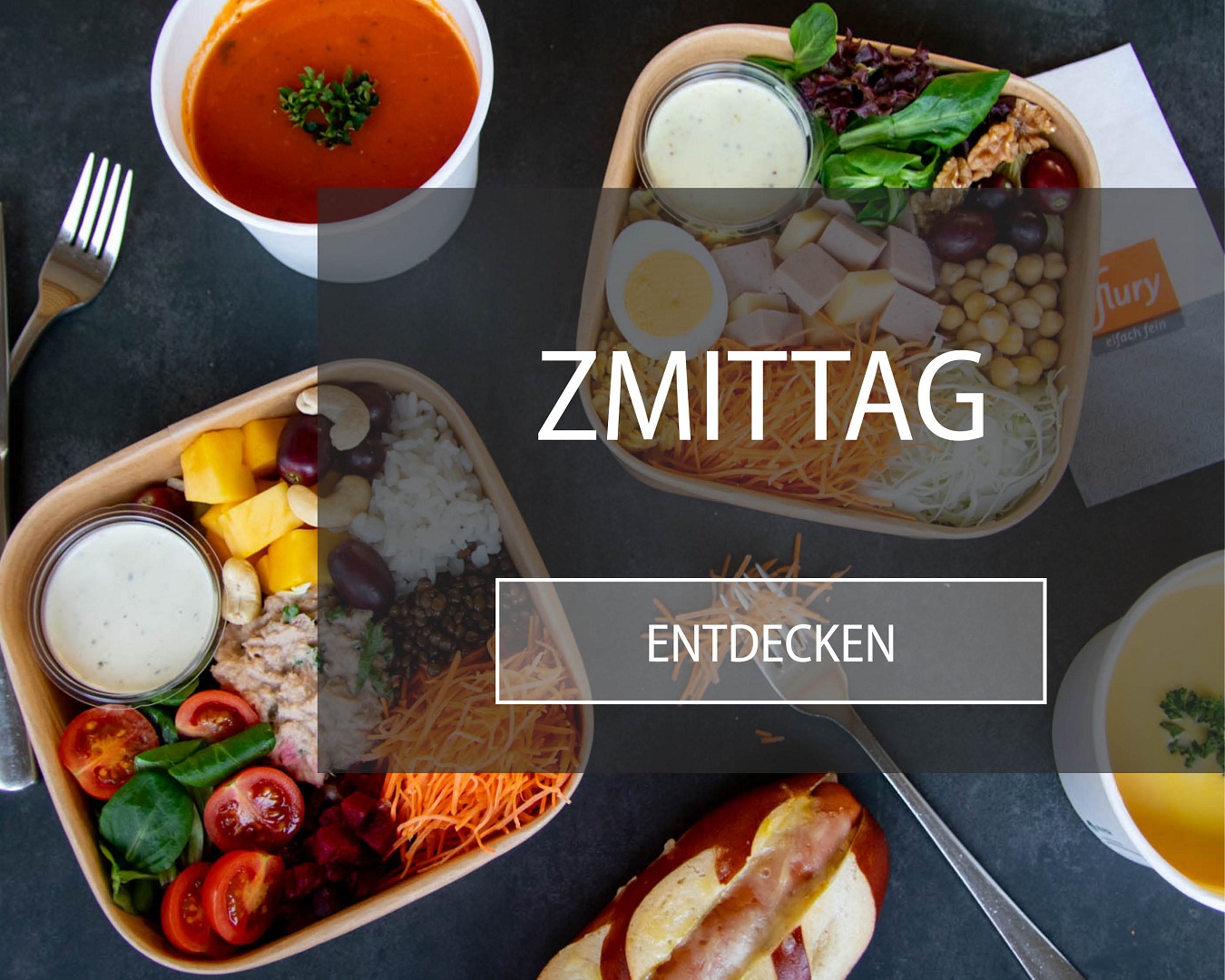 gesunde und ausgewogene Zmittag-Schalen mit frischen Zutaten, daneben verschiedene Tagessuppen und der Laugenknacker (Laugenbr&ouml;tchen mit Pouletwienerli, das mit K&auml;se &uuml;berbacken ist.)